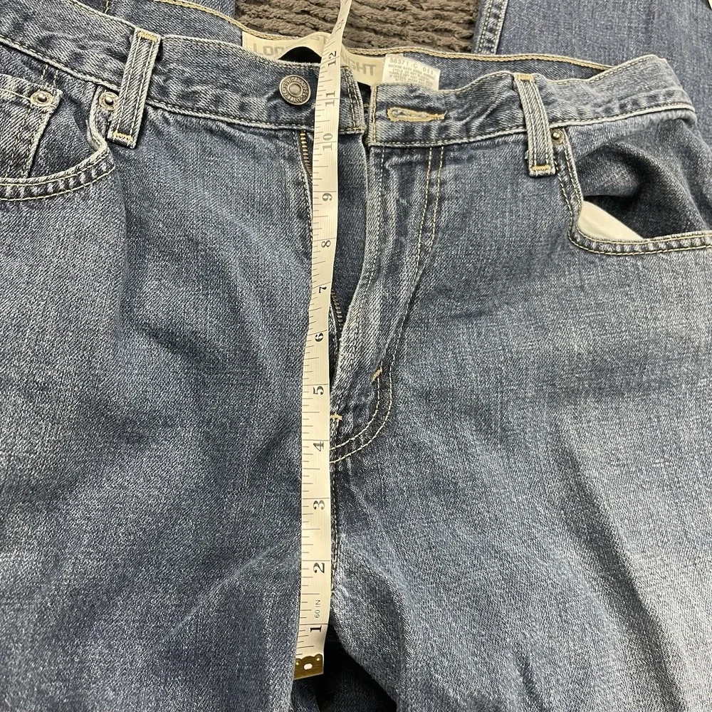 Vintage Levi's 569 Loose Straight Jeans Men's 34x29 Blue Denim Distressed Hem